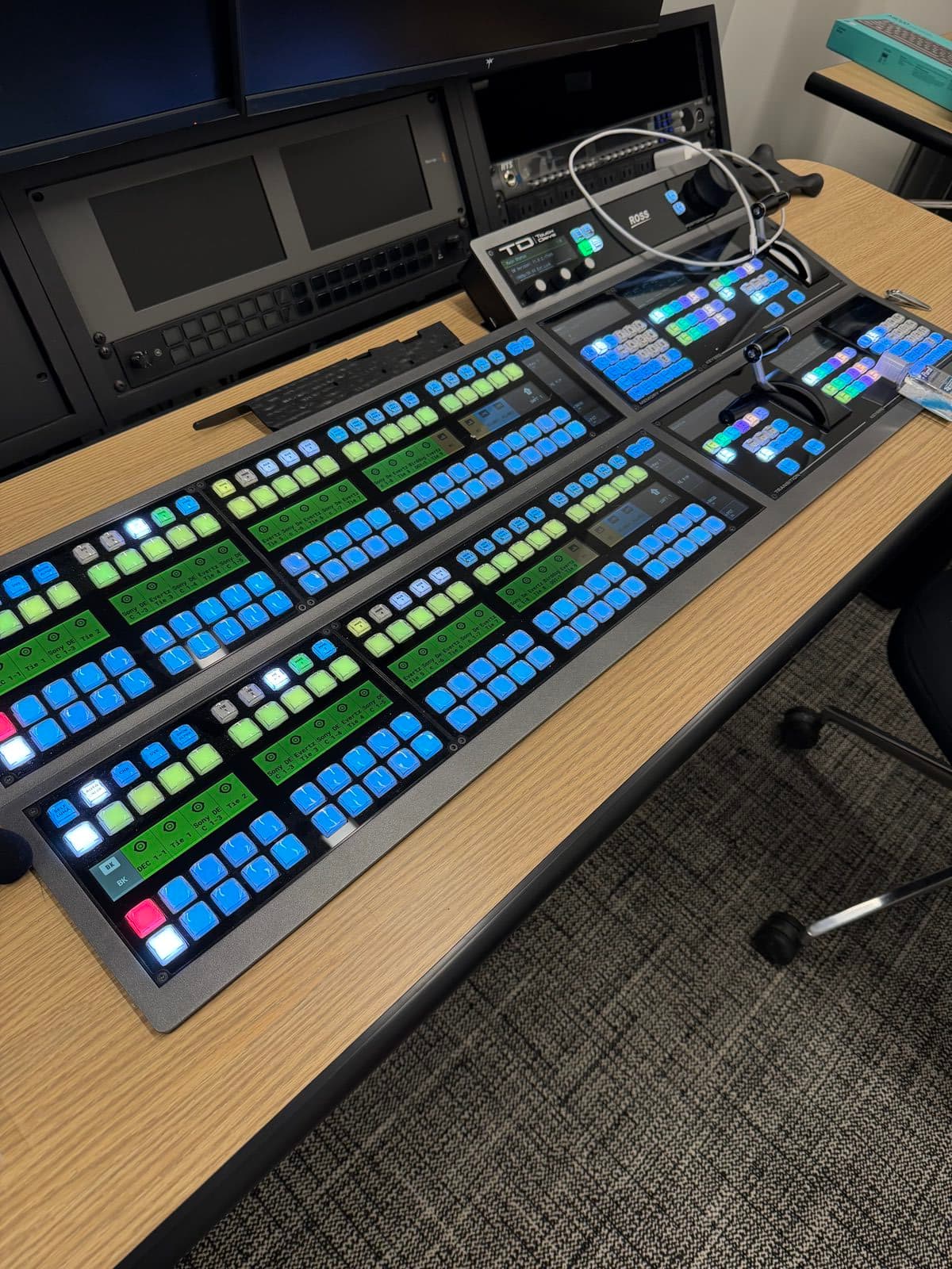 Production switcher panel in a broadcast control room